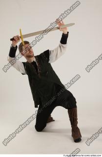 08 2019 01 KEETA KNEELING POSE WITH SWORD